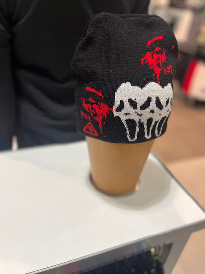 Dinamikplug Scary Sight Beanie in black knit with red splatter and white graphic, one size.
