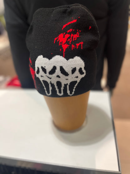 Dinamikplug Scary Sight Beanie with white skull graphic and red paint splat on black knit, one size fits all