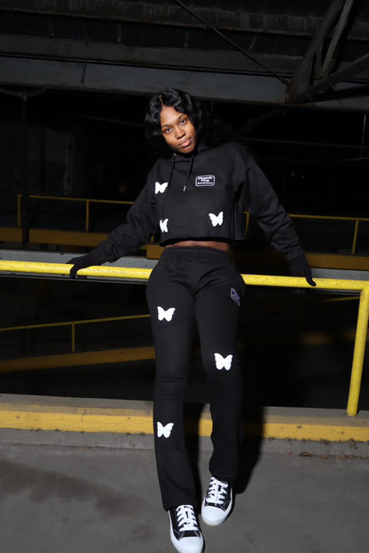 Dinamikplug Butterfly Takeover Sweat Set in black with cotton puff-print butterflies on hoodie and pants.