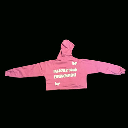 Pink cotton puff-print sweatshirt with white butterfly graphics and Takeover Your Environment.