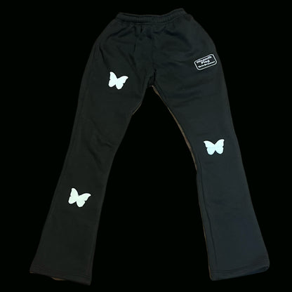 Dinamikplug Butterfly Takeover Sweat Set black pants with white butterfly patches and cotton puff print.